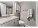 Bathroom with vanity, toilet and shower/tub combo at 7114 E Briarwood Dr, Centennial, CO 80112