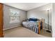 Small bedroom with a daybed and gray carpeting at 7114 E Briarwood Dr, Centennial, CO 80112