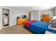 Bedroom with double bed and built in shelving at 7114 E Briarwood Dr, Centennial, CO 80112