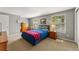 Spacious bedroom with double bed and ample closet space at 7114 E Briarwood Dr, Centennial, CO 80112