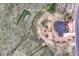 Aerial view of the home site illustrating the roof, surrounding landscaping, and large yard in a rural community at 9727 Red Primrose St, Franktown, CO 80116