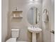 Half bath with pedestal sink at 9727 Red Primrose St, Franktown, CO 80116
