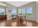 Cozy dining area featuring hardwood floors, natural light, and a charming chandelier at 9727 Red Primrose St, Franktown, CO 80116