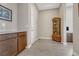 Hallway featuring tile flooring and cabinetry at 9727 Red Primrose St, Franktown, CO 80116