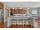 Stylish kitchen with granite countertops, stainless steel appliances, and a breakfast bar at 9727 Red Primrose St, Franktown, CO 80116