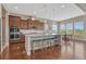 Gourmet kitchen featuring granite counters, stainless steel appliances, and a breakfast bar at 9727 Red Primrose St, Franktown, CO 80116