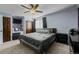 Cozy bedroom with modern ceiling fan and a closet at 17613 E Ohio Cir, Aurora, CO 80017