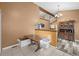 Dining area featuring bench seating, and an antique hutch at 17613 E Ohio Cir, Aurora, CO 80017