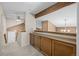 Upstairs hallway with storage and views to the lower level at 17613 E Ohio Cir, Aurora, CO 80017