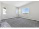 Simple bedroom with gray carpeting and large windows offering great views at 4704 Twelve Oaks Way, Castle Rock, CO 80104