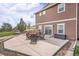 Spacious backyard patio with comfortable seating and outdoor dining at 555 Heritage Trl, Elizabeth, CO 80107