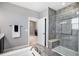 Updated bathroom with large tile shower, seat, and glass enclosure, plus double sinks at 555 Heritage Trl, Elizabeth, CO 80107
