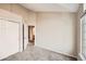 Bedroom with double doors leading to bathroom at 1456 Turnberry Dr, Castle Rock, CO 80104