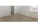 Bright bedroom features neutral carpet and windows for natural light at 13487 Valentia St, Thornton, CO 80602