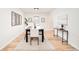 Bright dining room with hardwood floors and lots of natural light at 6889 Frying Pan Rd, Boulder, CO 80301