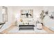 Cozy living room featuring stylish decor, a black glass coffee table, and soft natural light at 6889 Frying Pan Rd, Boulder, CO 80301