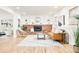 Cozy living room featuring a brick fireplace, built-in shelving, and stylish decor at 6889 Frying Pan Rd, Boulder, CO 80301