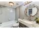 Clean bathroom featuring a shower over the tub, a neutral color palette, and a granite countertop vanity at 10360 Irving Ct, Westminster, CO 80031