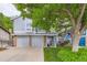 Charming home with a two-car garage, landscaped yard, and covered porch entry at 10360 Irving Ct, Westminster, CO 80031