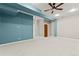 Unfinished basement with neutral walls and carpet at 5418 S Fundy Cir, Centennial, CO 80015