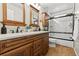 Bathroom with double vanity and shower/tub combo at 5418 S Fundy Cir, Centennial, CO 80015