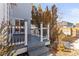 Back deck with railing, steps, and solar lights at 5418 S Fundy Cir, Centennial, CO 80015