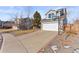 Two-story house with gray siding, attached garage, and basketball hoop at 5418 S Fundy Cir, Centennial, CO 80015