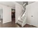 Staircase with white railing leading to the upper level at 5418 S Fundy Cir, Centennial, CO 80015