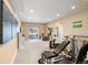 Finished basement with neutral walls, carpet, and walkout sliding doors with views of the exterior at 5591 Canyon View Dr, Castle Rock, CO 80104