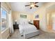 Inviting bedroom with a vaulted ceiling, a queen-size bed, and a window with natural light at 5591 Canyon View Dr, Castle Rock, CO 80104