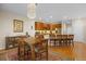 Elegant dining room adjacent to the kitchen, featuring stylish lighting and ample space for Gathering dinners at 5591 Canyon View Dr, Castle Rock, CO 80104
