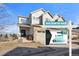 Inviting two-story home showcasing a mix of stone and siding, set on a landscaped lot at 5591 Canyon View Dr, Castle Rock, CO 80104