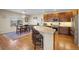 Modern kitchen with stainless steel appliances, a breakfast bar, and ample cabinet space, ideal for cooking enthusiasts at 5591 Canyon View Dr, Castle Rock, CO 80104