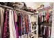 Walk-in closet is well-organized, with clothing racks, shelving and storage containers at 5591 Canyon View Dr, Castle Rock, CO 80104