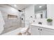 Modern bathroom with sleek shower, rainfall shower head, and stylish vanity at 8826 E Florida Ave # G12, Denver, CO 80247