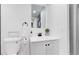 Bathroom featuring white vanity, modern fixtures, and stylish decor at 8826 E Florida Ave # G12, Denver, CO 80247