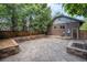 Backyard patio with brick accents, wood fence, and paver stones offering a serene outdoor space for relaxation at 3019 Meade St, Denver, CO 80211