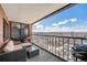 Private balcony with comfortable seating, a grill, and panoramic city views at 1551 Larimer St # 2602, Denver, CO 80202