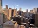 Daytime view of the city skyline, highlighting prominent buildings and architectural details at 1551 Larimer St # 2602, Denver, CO 80202