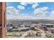 Panoramic city view showcasing a vibrant skyline and distant mountain peaks on a clear day at 1551 Larimer St # 2602, Denver, CO 80202