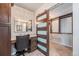 A dressing room with a makeup vanity, marble floors and a walk-in closet at 1551 Larimer St # 2602, Denver, CO 80202