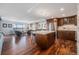 Stylish kitchen boasts stainless steel appliances, a center island with seating, and an open concept layout at 1551 Larimer St # 2602, Denver, CO 80202