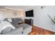 Comfortable living room features a large sectional sofa, hardwood floors, and modern décor at 1551 Larimer St # 2602, Denver, CO 80202