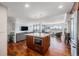 Open concept living space featuring a modern kitchen, cozy living room and breathtaking views at 1551 Larimer St # 2602, Denver, CO 80202