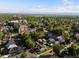 Panoramic aerial view of a neighborhood with tree-lined streets and various architectural styles at 3339 Lowell Blvd, Denver, CO 80211