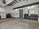 Spacious garage with white cabinets, ample storage, and a clean, organized layout for practical use and functionality at 3339 Lowell Blvd, Denver, CO 80211