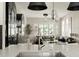 Bright modern kitchen with gray countertop and an open living room layout at 3339 Lowell Blvd, Denver, CO 80211