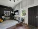 Versatile studio space with modern decor, natural light, and a dedicated work area, perfect for creative pursuits at 3339 Lowell Blvd, Denver, CO 80211