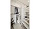 Organized walk-in closet with custom shelving and storage solutions for optimal space utilization at 3339 Lowell Blvd, Denver, CO 80211