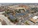 Aerial view of the complex featuring a swimming pool and a common green space at 3009 Madison Ave # K317, Boulder, CO 80303